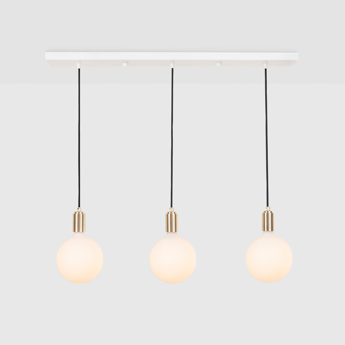 Linear Triple Pendant in Brass + Sphere IV · Tala US
