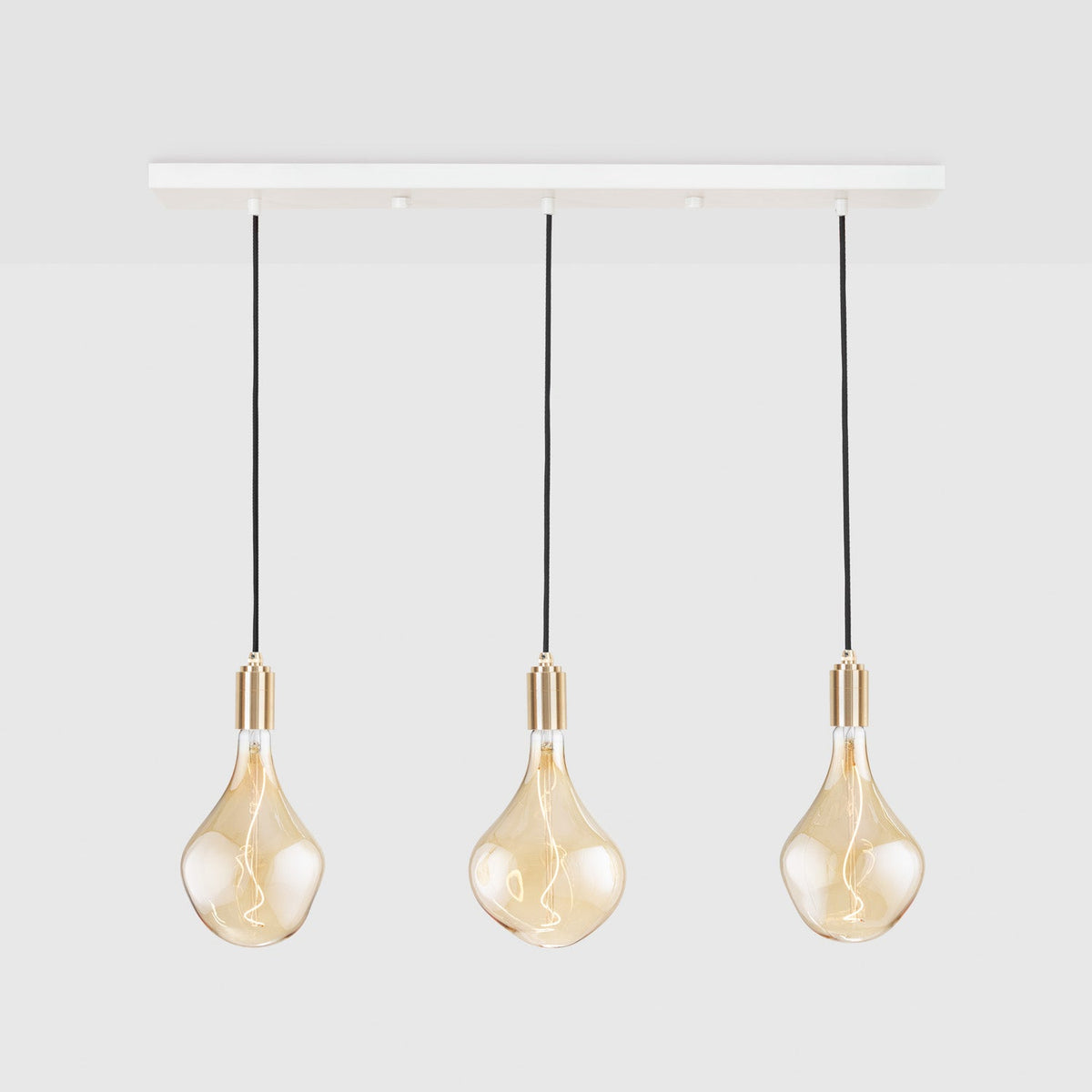 Linear Triple Pendant in Brass + Voronoi II · Tala US