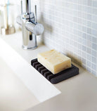 Yamazaki Home · Black Self - Draining Silicone Soap Dish · Yamazaki Home | socius design in Rochester, MN