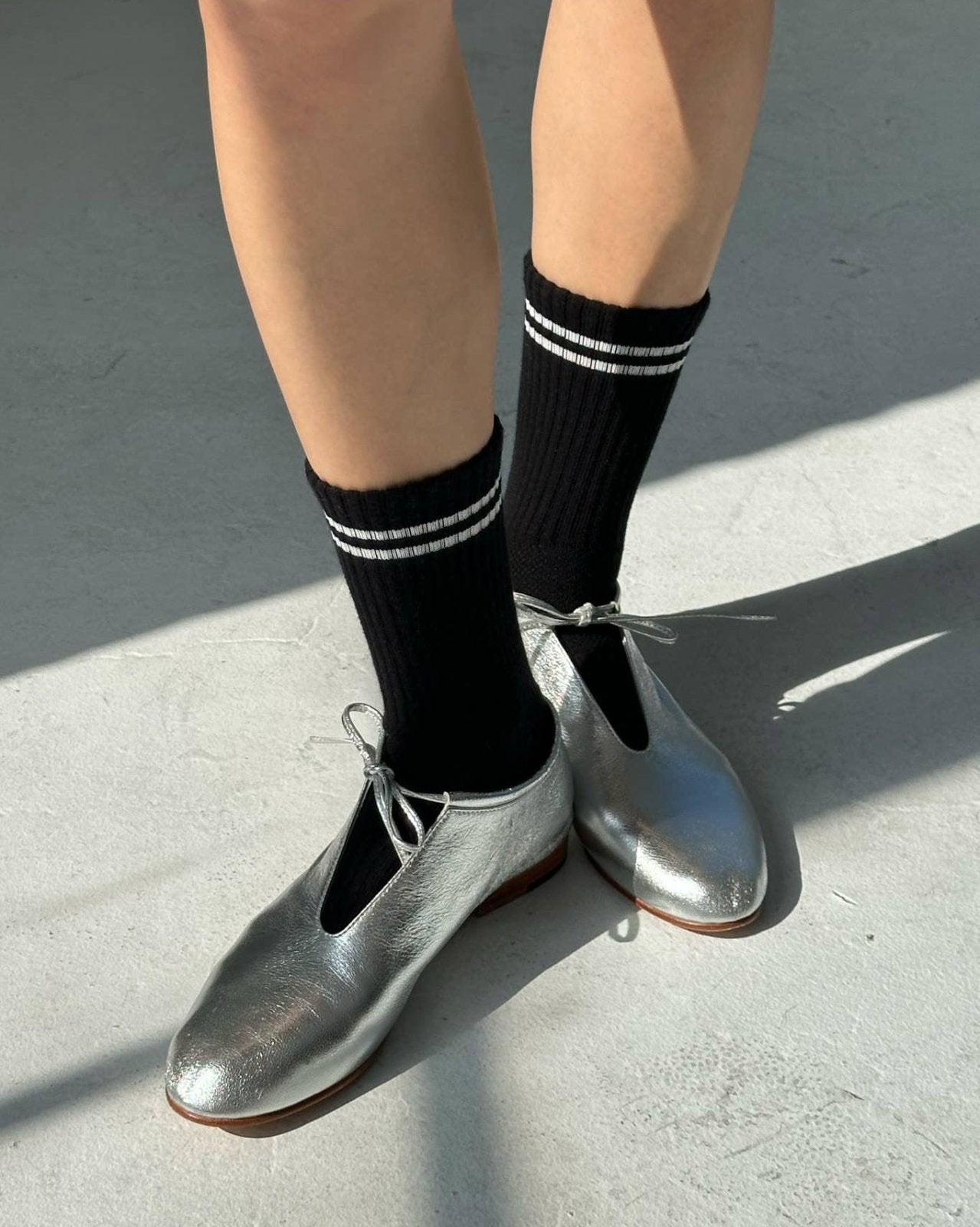 Model wearing Le Bon Shoppe Boyfriend socks in noir. Shop at socius design shop in Rochester, MN.