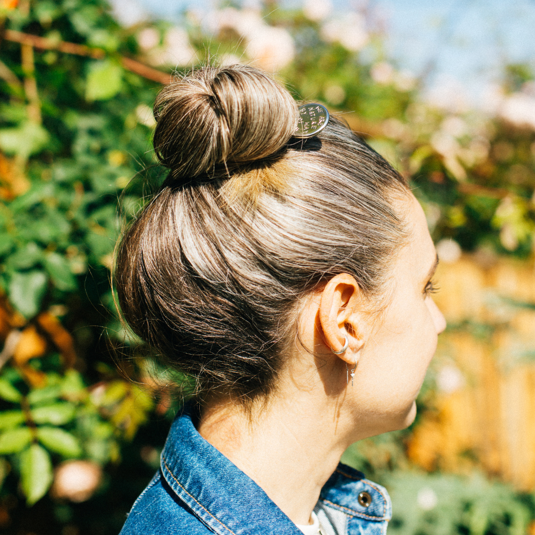 Botnia SPF Tube Key worn as a hairpin