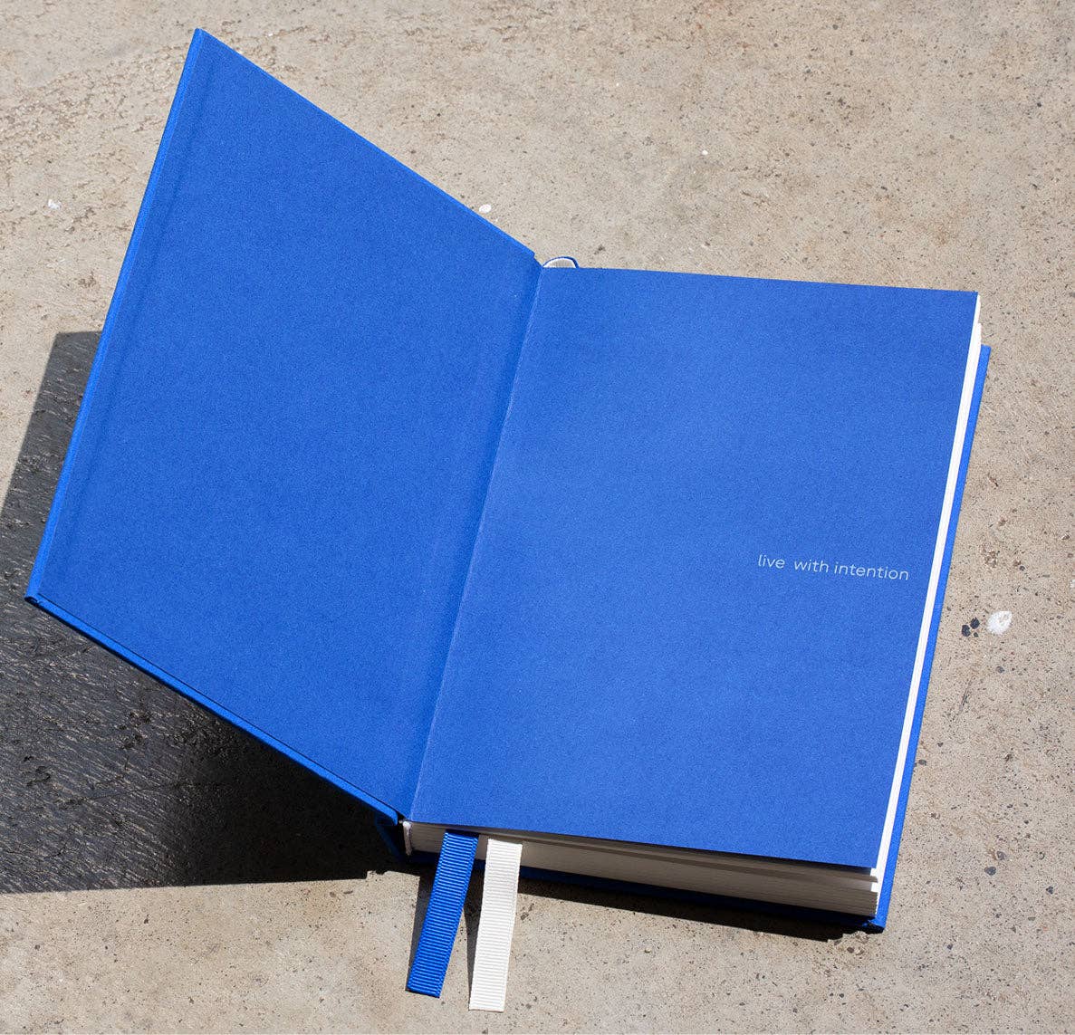 Gry Mattr by Joe Mimran · The Essential Linen Notebook in Pool | socius design in Rochester, MN