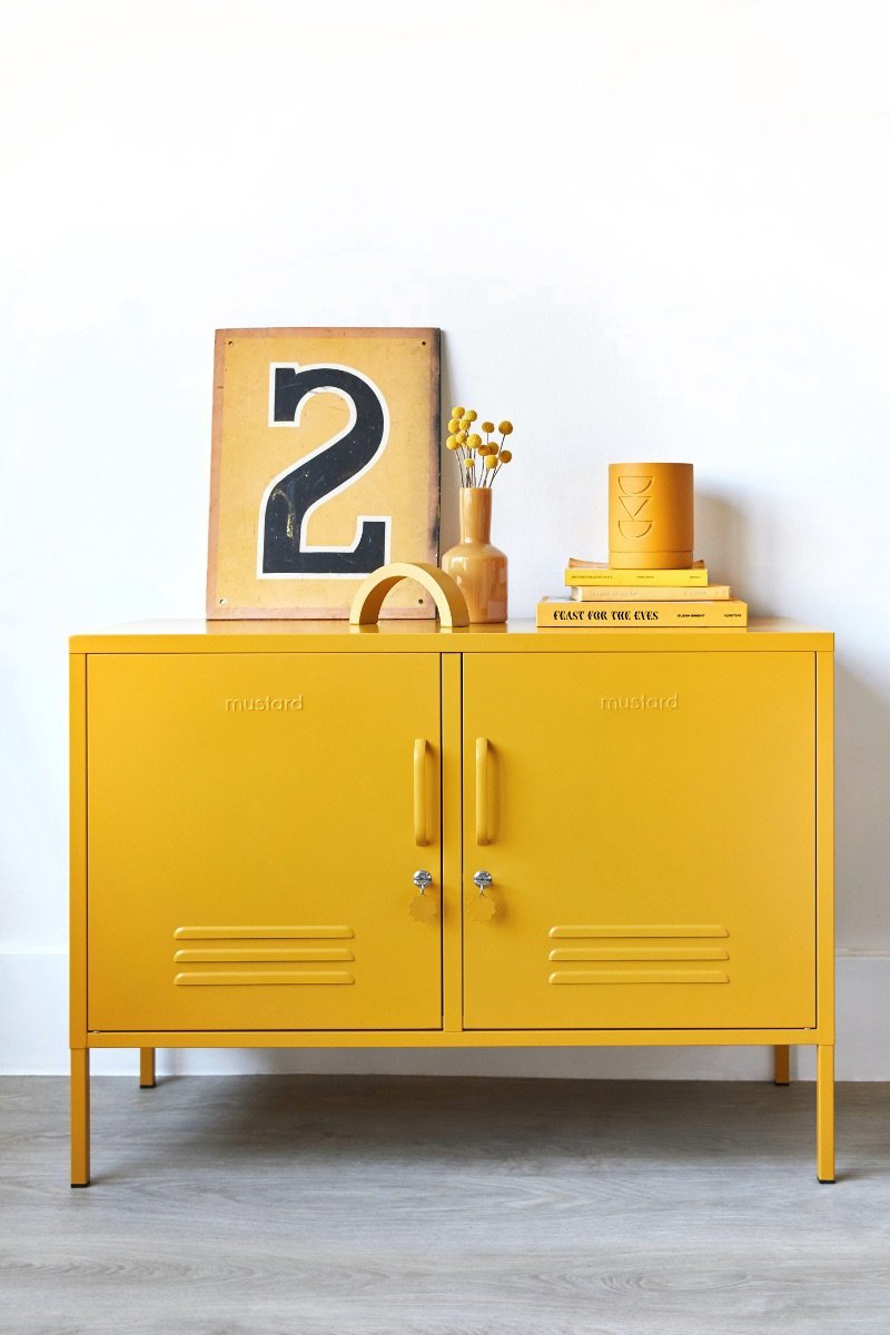 The Lowdown locker in Mustard styled in a living room